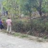 Peduli Lingkungan, Babinsa Kodim Ponorogo Bersihkan Jalan Bersama Warga