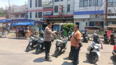 Sambangi Korlap Parkir PGC, Bhabinkamtibmas Polsek Utbar Sampaikan Pesan Kamtibmas: Perkuat Kerja Sama, Wujudkan Lingkungan Aman dan Tertib