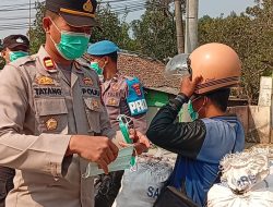 Kapolsek Cimarga Polres Lebak Menggandeng Puskesmas Kec. Cimarga, Bagikan Masker di Wilayah Kecamatan Cimarga