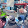 Antisipasi Dampak Erupsi Gunung Krakatau, Polsek Sunda Kelapa, Bagikan 250 Masker kepada Nelayan