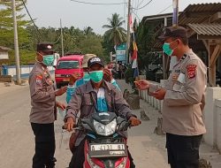 Polsek Cimarga Polres Lebak Bagikan Masker Antisifasi Abu Vulkanik Anak Krakatau
